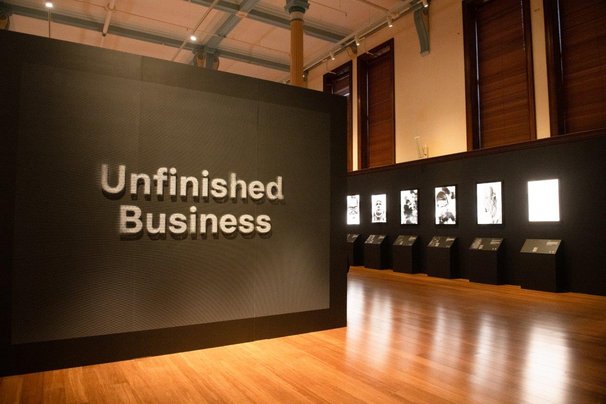 Unfinished Business title wall