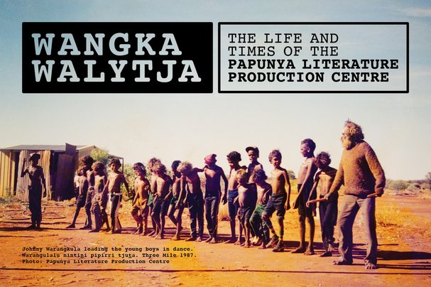 Johnny Warangkula leading the young boys in dance